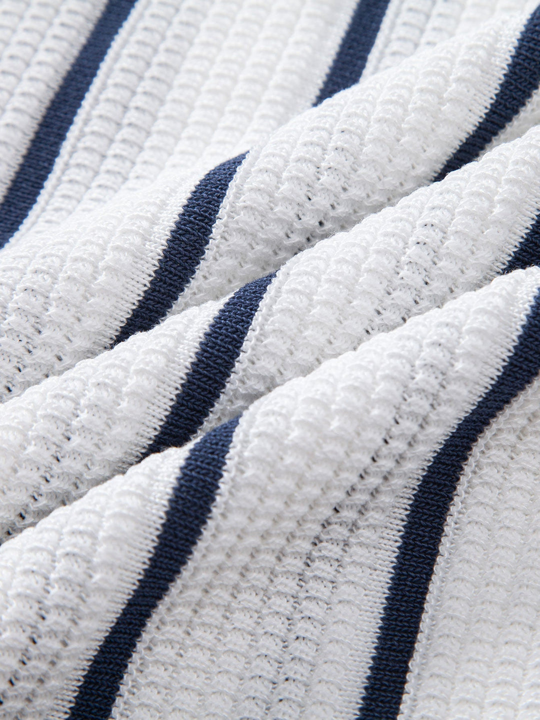 Chemise à boutons en maille rayée