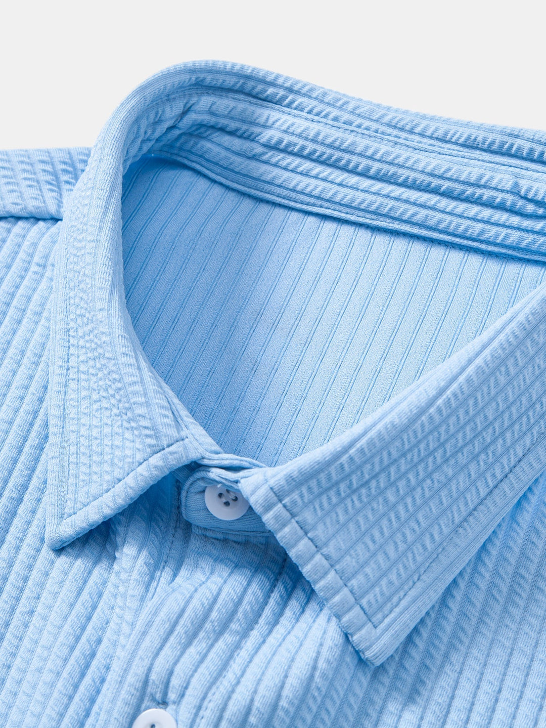 Chemise côtelée à manches longues, ajustée muscle, à boutons