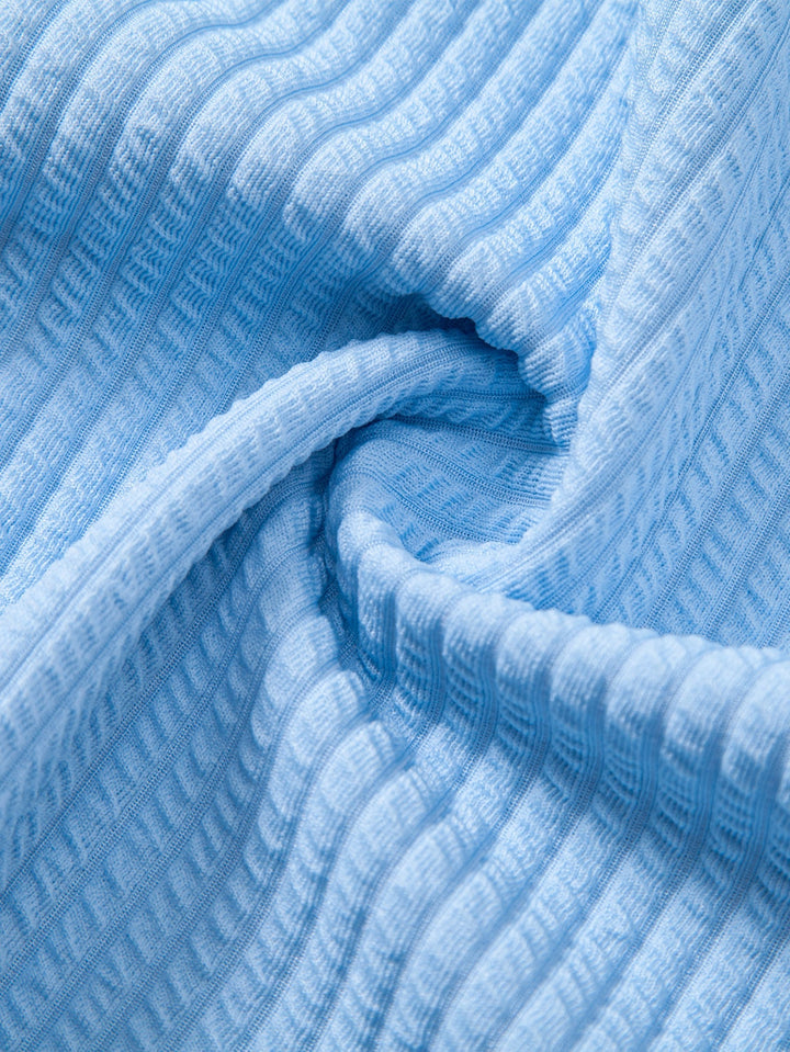 Chemise côtelée à manches longues, ajustée muscle, à boutons